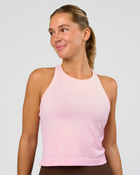 Woman wearing AeroFLX+ Seamless Flow Skimmer Tank - Marshmallow/Marshmallow | Model:Amity | Size:S