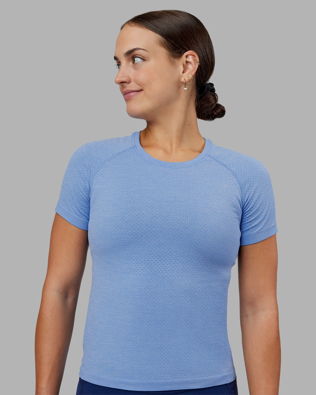 Woman wearing AeroFLX+ Seamless Tee - Cornflower Blue/Cornflower Blue | Model:Keisha | Size:S