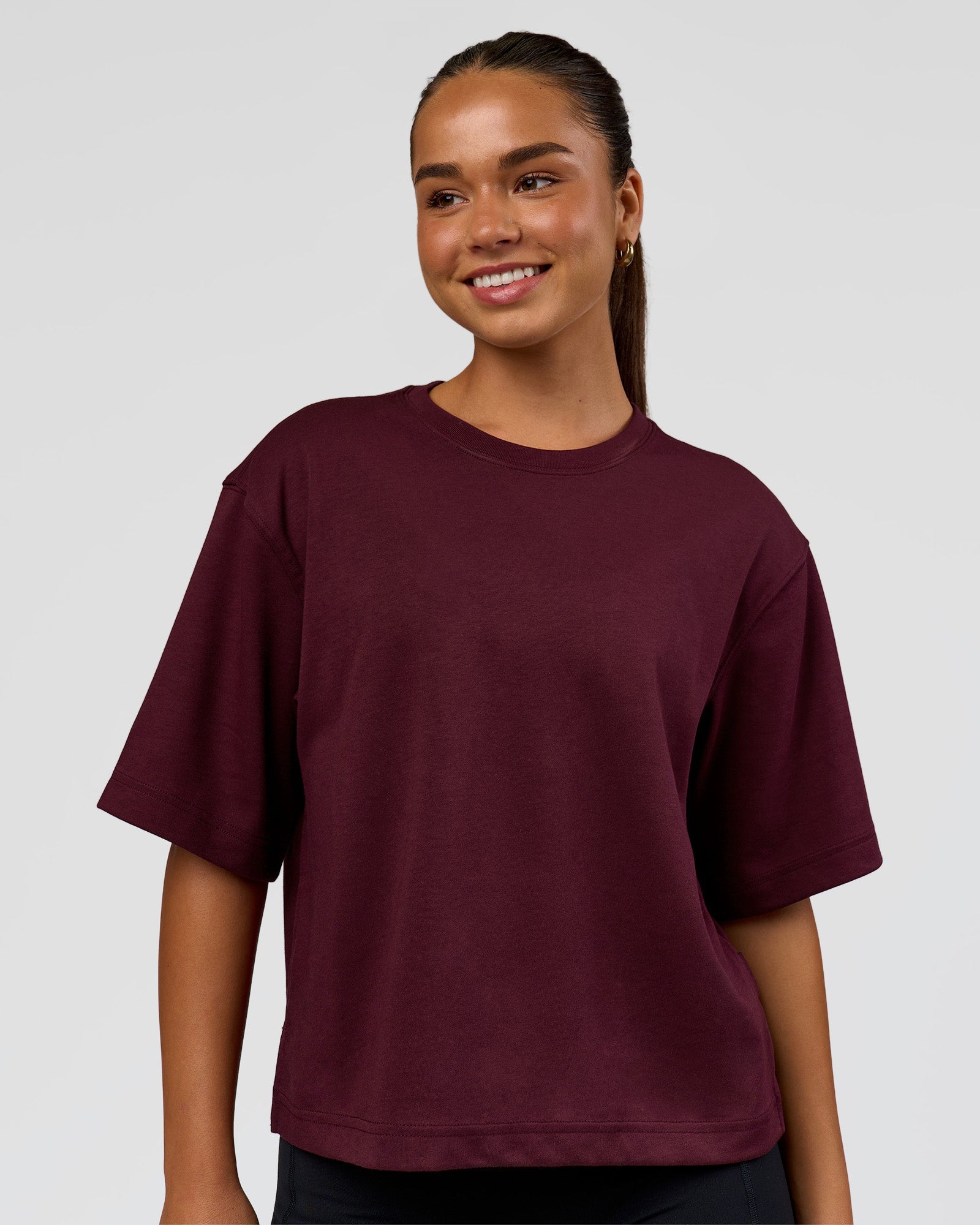 Woman wearing AfterDark ZeroCrease Cropped Tee - Cherry Lacquer | Model:Sophia | Size:S