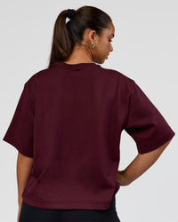 Woman wearing AfterDark ZeroCrease Cropped Tee - Cherry Lacquer | Model:Sophia | Size:S