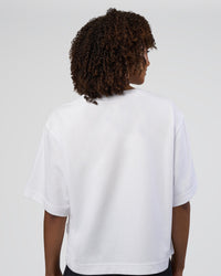 Woman wearing AfterDark ZeroCrease Cropped Tee - White | Model:Tomi | Size:S