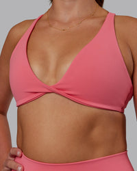 Woman wearing Agile Sports Bra - Pink Lemonade | Model:Phoebe | Size:S