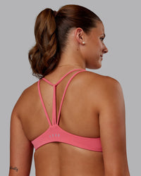 Woman wearing Agile Sports Bra - Pink Lemonade | Model:Phoebe | Size:S