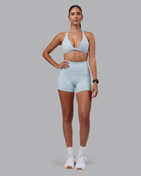 Woman wearing Agile Sports Bra - Skyride | Model:Rhiley | Size:S