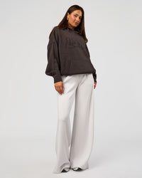 Woman wearing All Day Active Knitted Hoodie - Dark Storm | Model:Bianca | Size:S