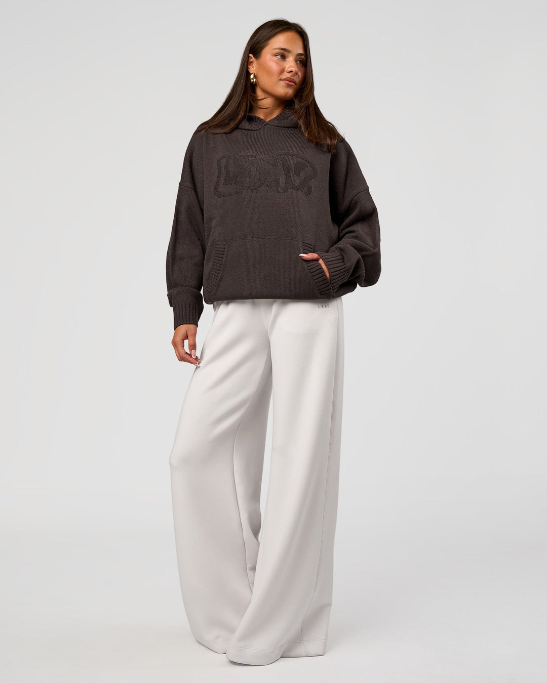Woman wearing All Day Active Knitted Hoodie - Dark Storm | Model:Bianca | Size:S