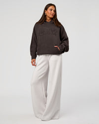 Woman wearing All Day Active Knitted Hoodie - Dark Storm | Model:Bianca | Size:S