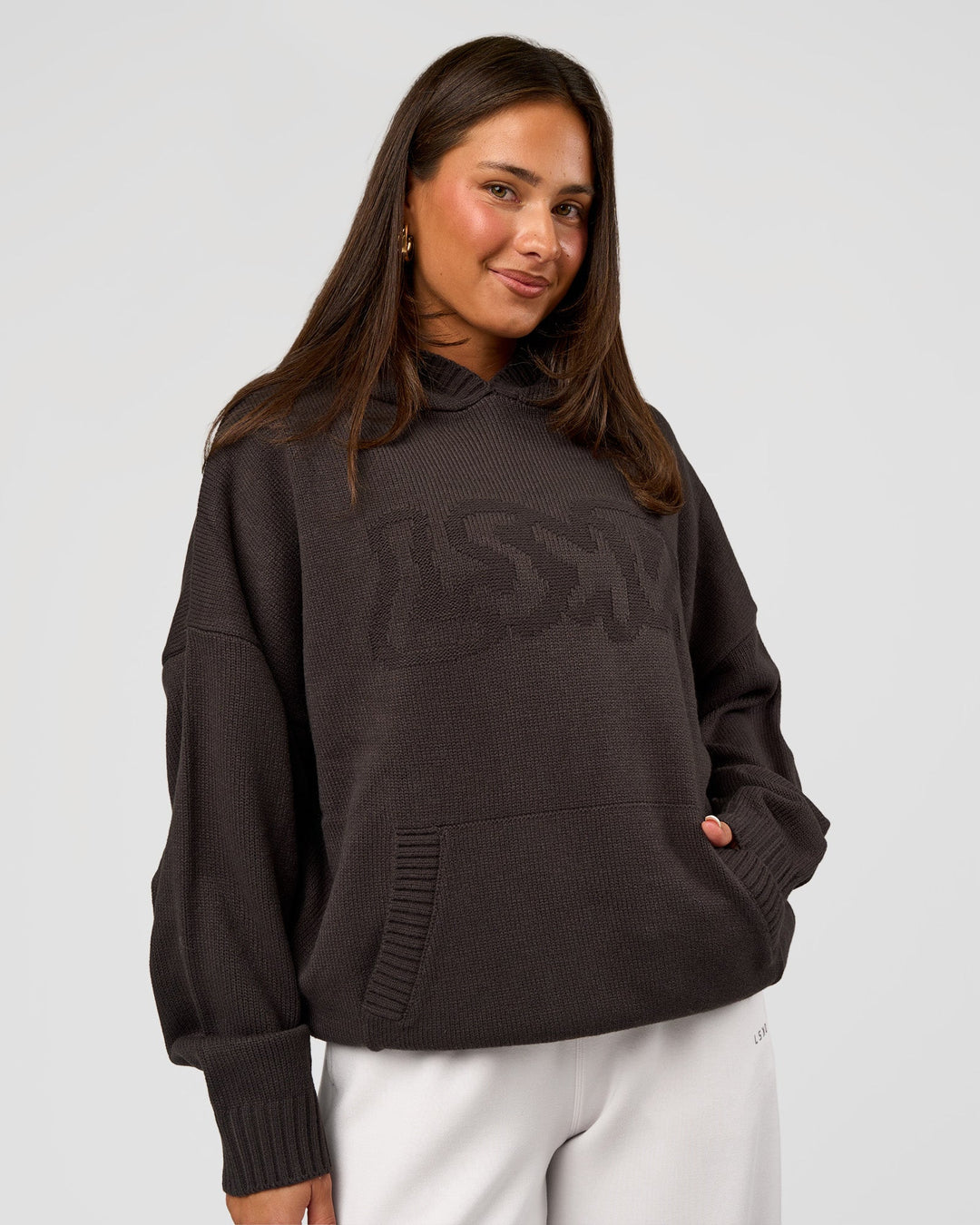 Woman wearing All Day Active Knitted Hoodie - Dark Storm | Model:Bianca | Size:S