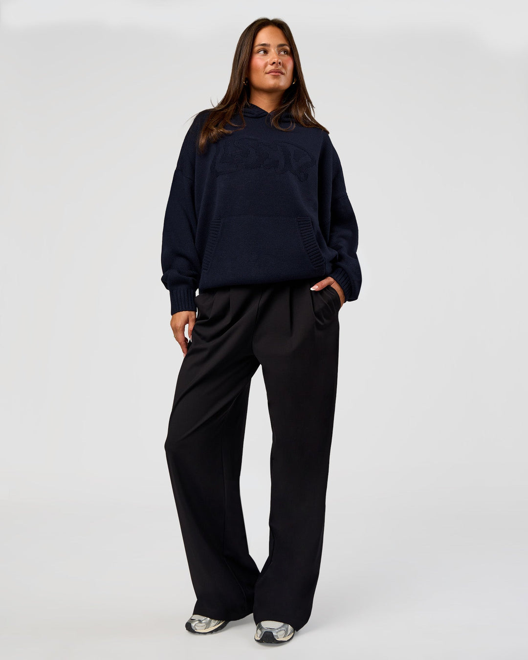 Woman wearing All Day Active Knitted Hoodie - Future Navy | Model:Bianca | Size:S