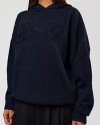 Woman wearing All Day Active Knitted Hoodie - Future Navy | Model:Bianca | Size:S