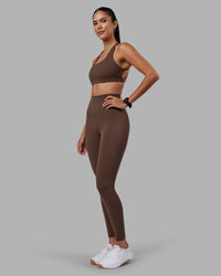 Woman wearing Aspire Sports Bra - Chocolate Martini | Model:Rhiley | Size:S