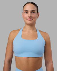 Woman wearing Aspire Sports Bra - Open Air | Model:Keisha | Size:S