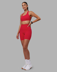 Woman wearing Aspire Sports Bra - Scarlet | Model:Rhiley | Size:S