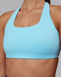 Woman wearing Aspire Sports Bra - Sky Blue | Model:Rhiley | Size:S