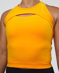 Woman wearing Be Bold Performance Tank - Zinnia | Model:Tenaya | Size:S