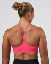 Woman wearing Be Bold Sports Bra - Bright Raspberry | Model:Tenaya | Size:S