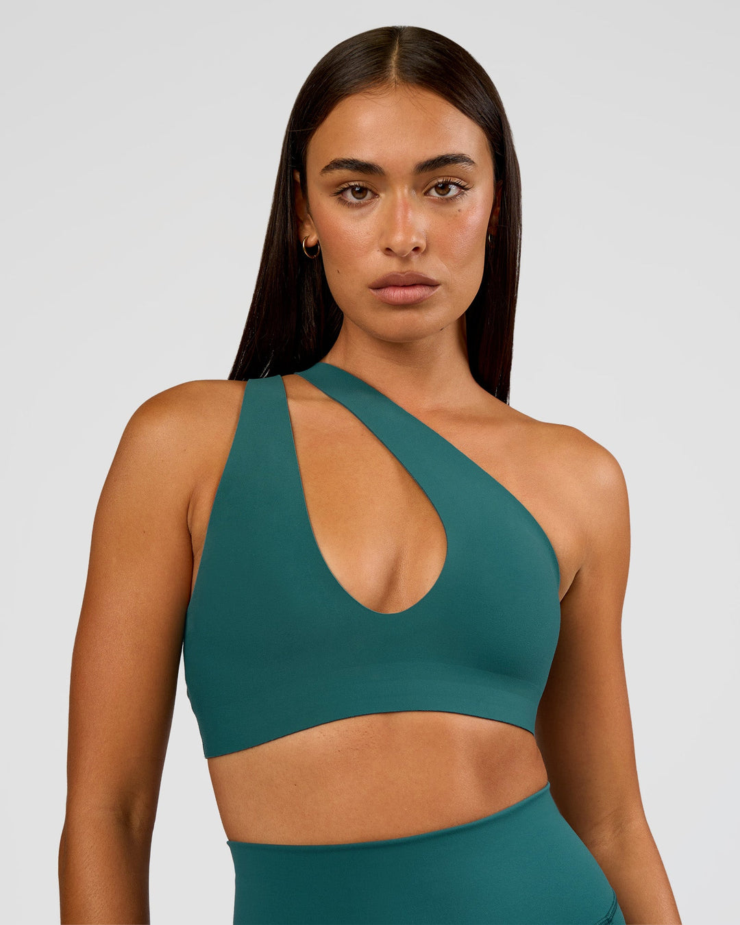 Woman wearing Bend &amp; FLX Plunge Sports Bra - Transformative Teal | Model:Ruby | Size:S