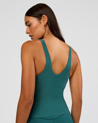 Woman wearing Bend & FLX Plunge Tank - Transformative Teal | Model:Ruby | Size:S