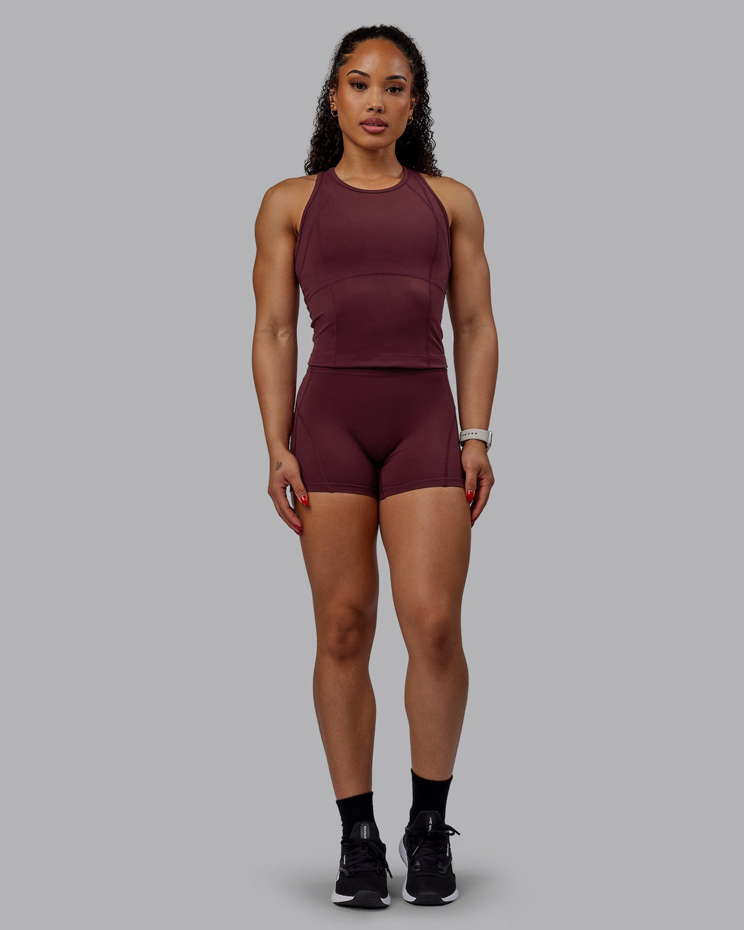 Woman wearing Bend Performance Tank - Dark Cherry