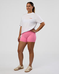 Woman wearing Break Through FLXCotton Oversized Tee - White-Pale Lilac | Model:Renee | Size:S