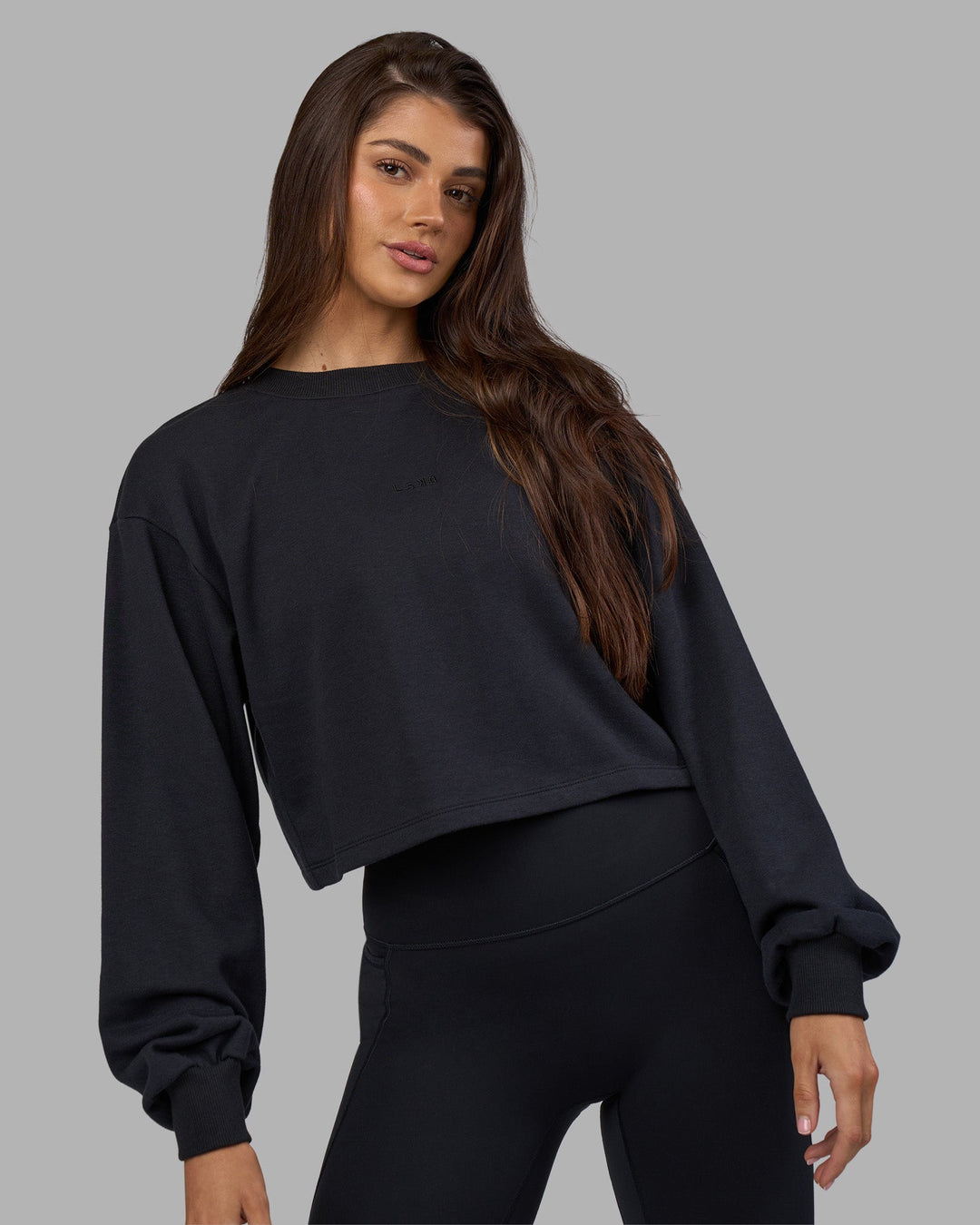 Woman wearing Breeze Open Back Sweater - Black-Black | Model:Phoebe | Size:S