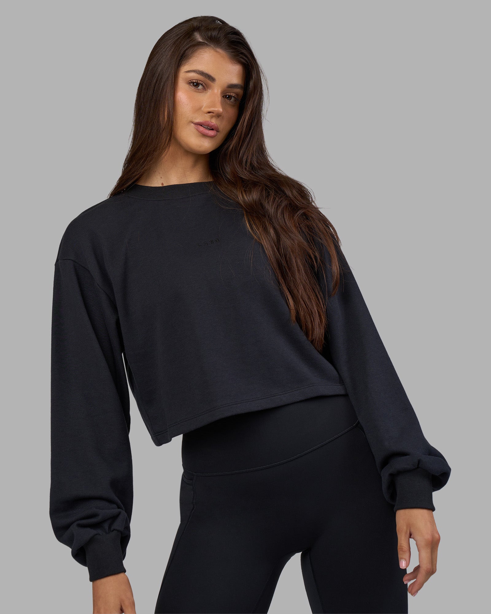 Woman wearing Breeze Open Back Sweater - Black-Black | Model:Phoebe | Size:S