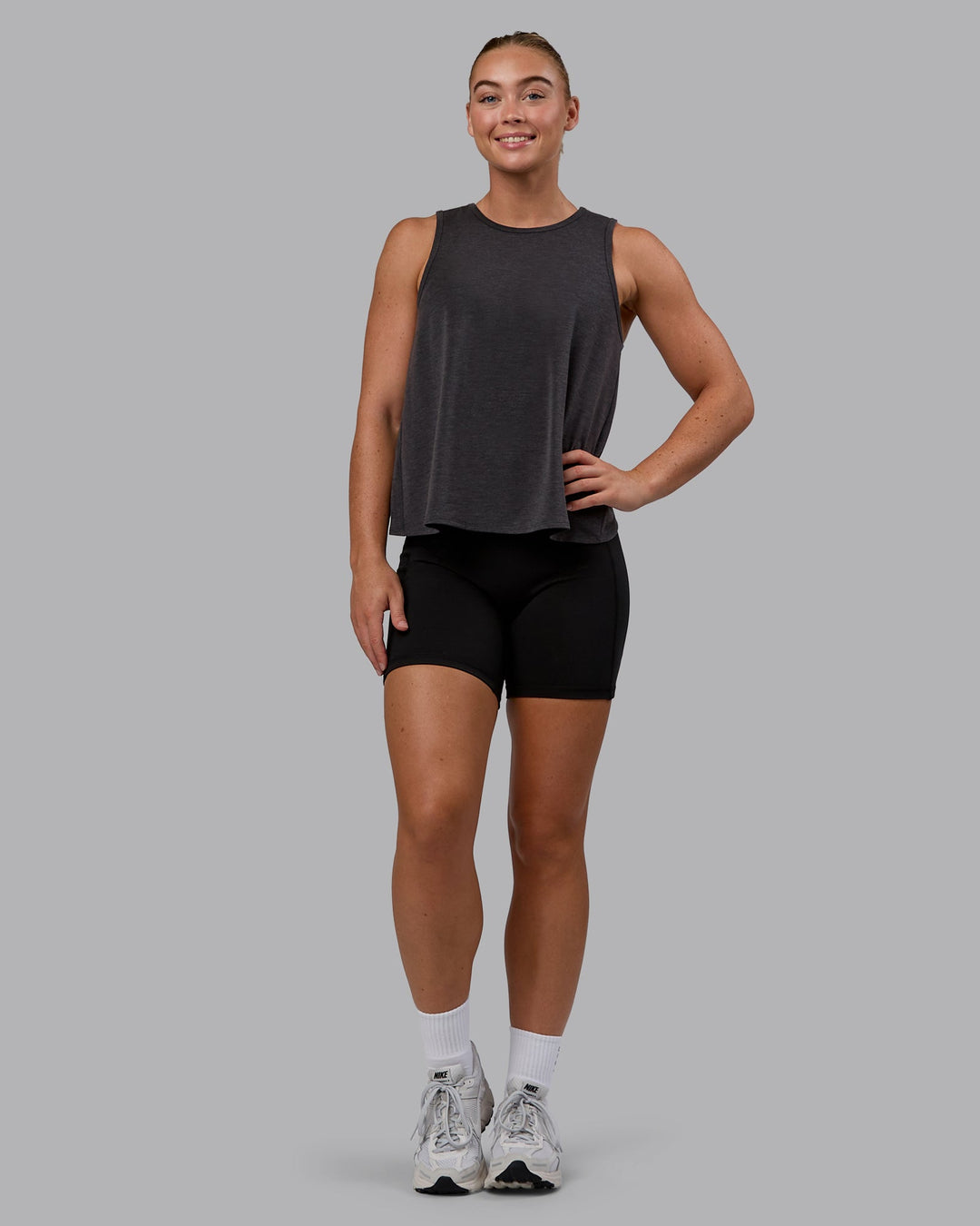 Woman wearing Breeze Training Tank - Black