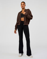 Woman wearing CF Elevate SoftTouch Bomber - Hot Chocolate | Model:Rosie | Size:S
