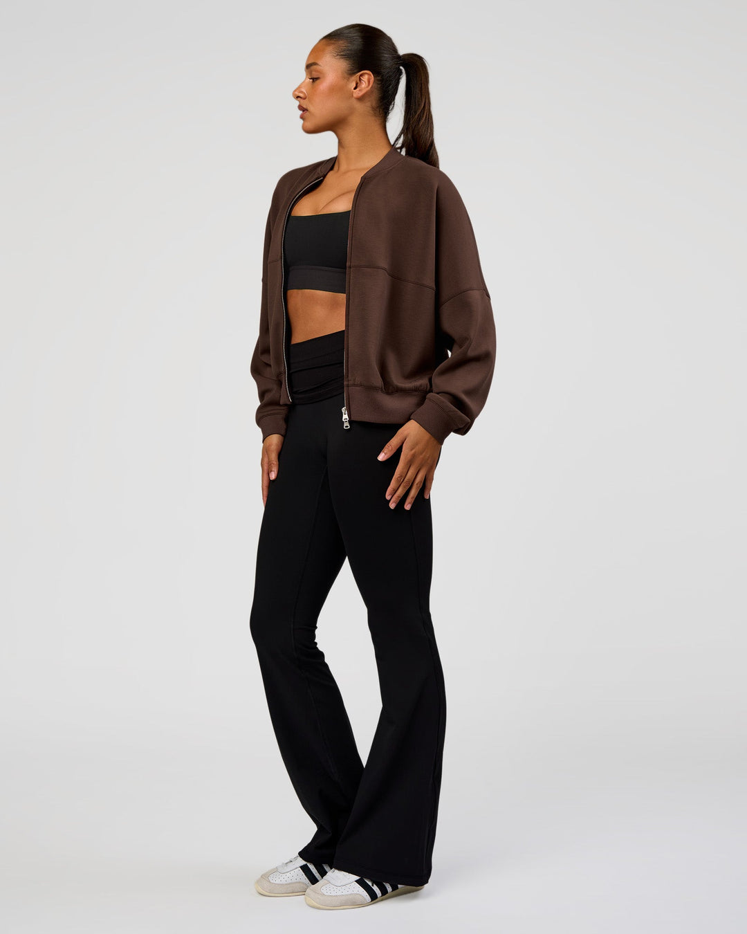 Woman wearing CF Elevate SoftTouch Bomber - Hot Chocolate | Model:Rosie | Size:S