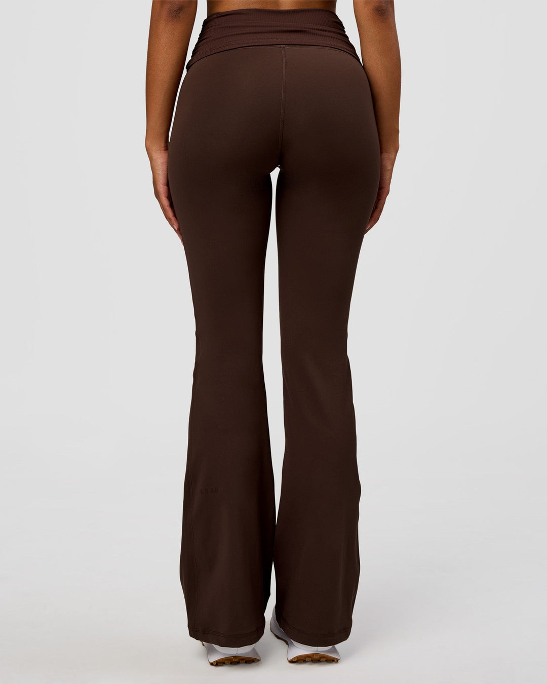 Model wearing CF Fold Over High-Rise Flared Legging - Hot Chocolate | Model:Jordan | Size:S