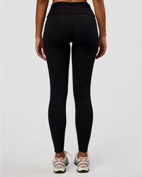 Model wearing CF Fold Over High-Rise Full Length Legging - Black | Model:Jordan | Size:S