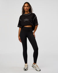 Model wearing CF Fold Over High-Rise Full Length Legging - Black | Model:Jordan | Size:S