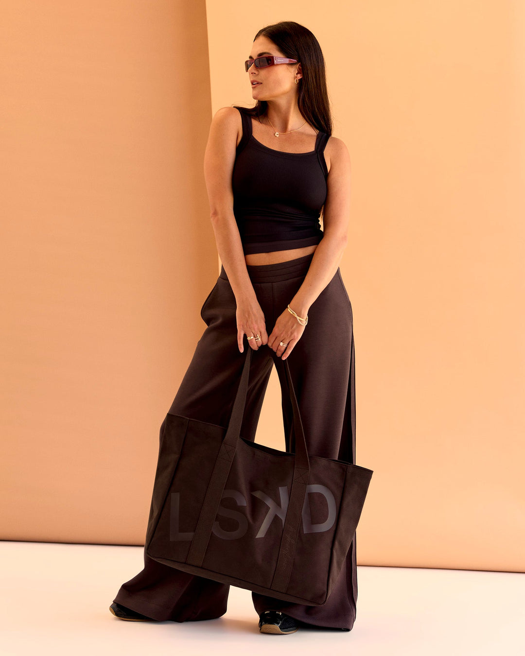 Woman wearing CF Move Through It Rib Tank - Black | Model:Chloe | Size:S