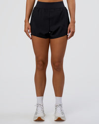 Woman wearing Challenger 3" Lined Performance Short - Black | Model:Amity | Size:S