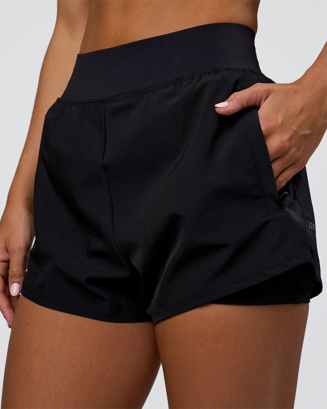 Woman wearing Challenger 3&quot; Lined Performance Short - Black | Model:Amity | Size:S