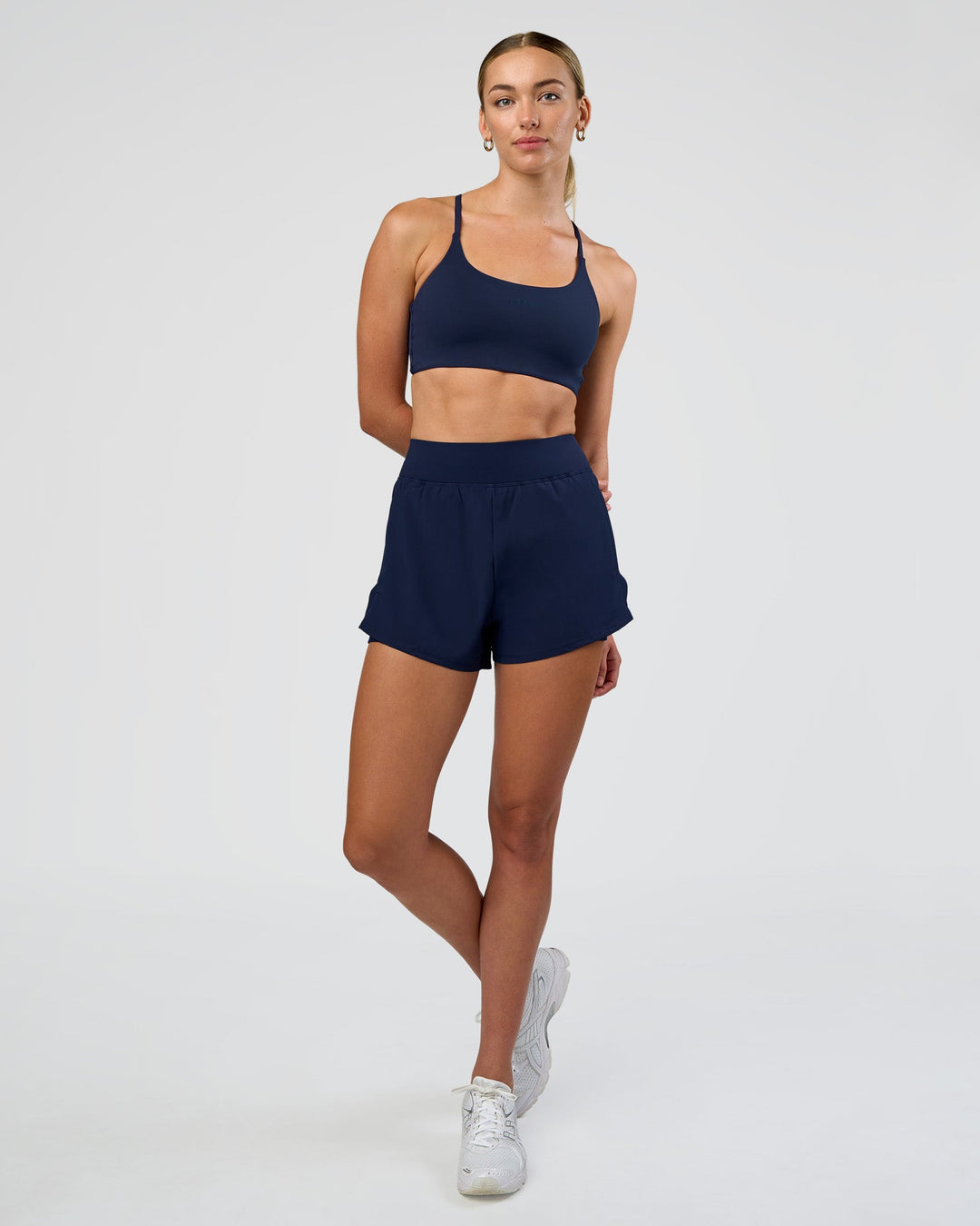 Woman wearing Challenger 3" Lined Performance Short - Future Navy | Model:Evie | Size:S