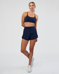 Woman wearing Challenger 3" Lined Performance Short - Future Navy | Model:Evie | Size:S
