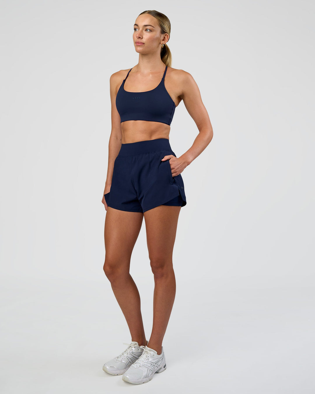 Woman wearing Challenger 3" Lined Performance Short - Future Navy | Model:Evie | Size:S