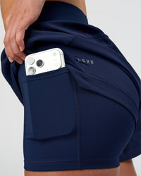 Woman wearing Challenger 3" Lined Performance Short - Future Navy | Model:Evie | Size:S