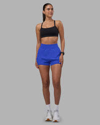 Woman wearing Challenger 3" Lined Performance Short - Power Cobalt | Model:Rhiley | Size:S