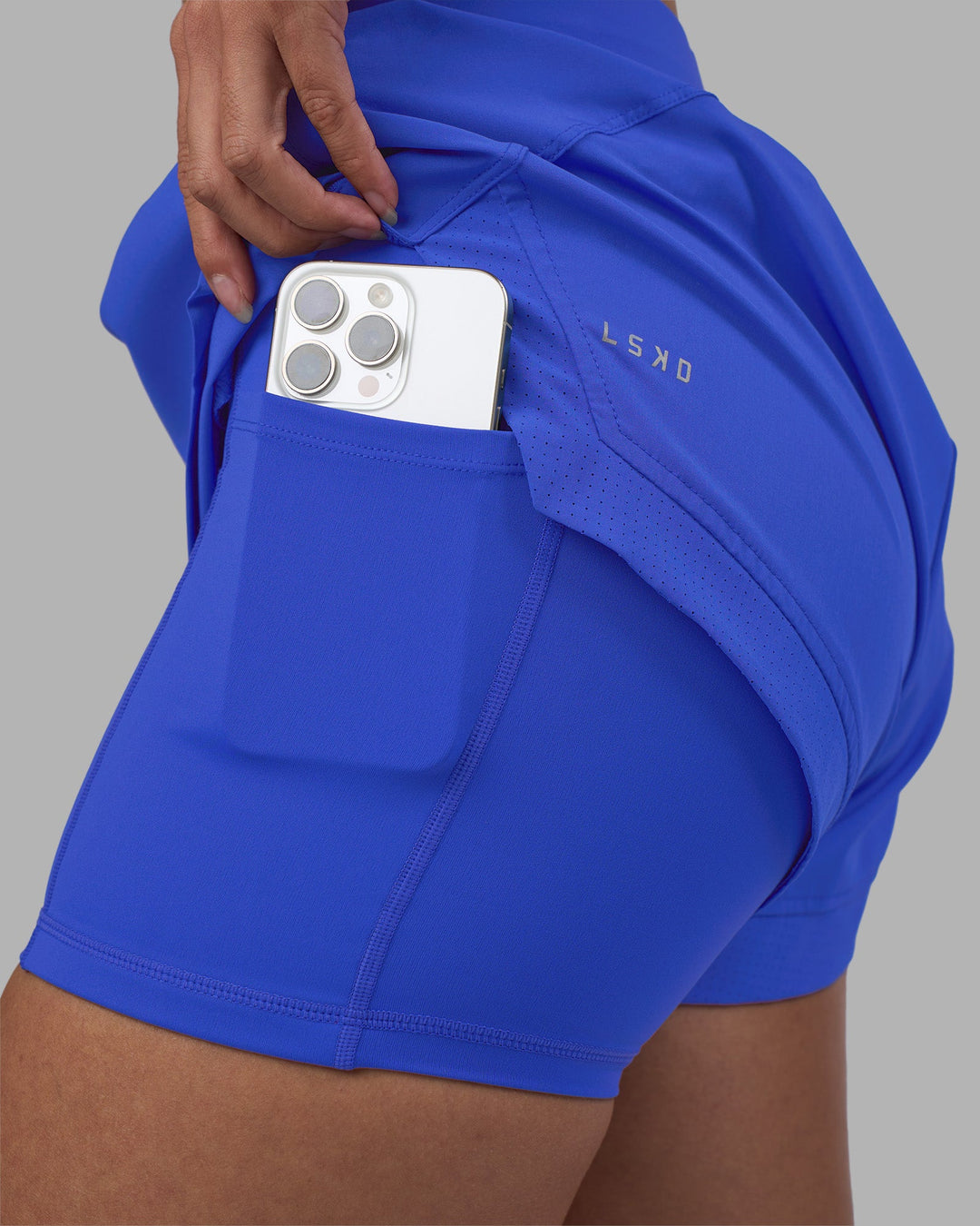 Woman wearing Challenger 3&quot; Lined Performance Short - Power Cobalt | Model:Rhiley | Size:S