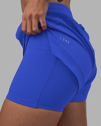 Woman wearing Challenger 3" Lined Performance Short - Power Cobalt | Model:Rhiley | Size:S