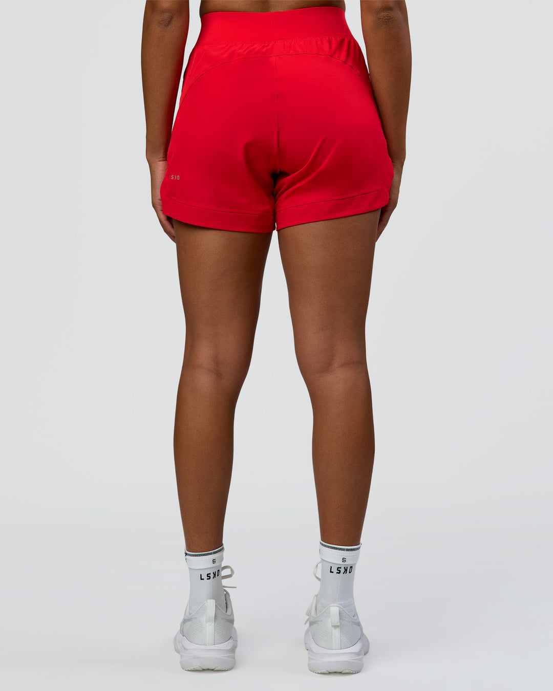 Woman wearing Challenger 3" Lined Performance Short - Scarlet | Model:Rosie | Size:S