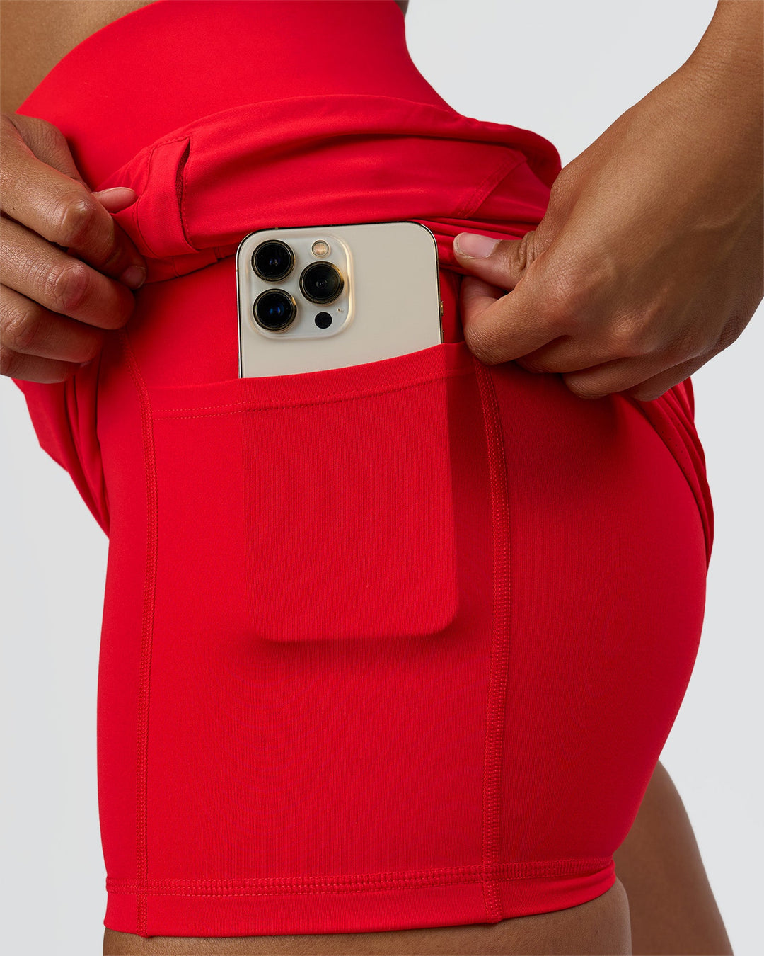 Woman wearing Challenger 3" Lined Performance Short - Scarlet | Model:Rosie | Size:S