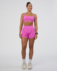 Woman wearing Challenger 3" Lined Performance Short - Ultra Fuchsia | Model:Abbey | Size:S