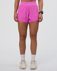 Woman wearing Challenger 3" Lined Performance Short - Ultra Fuchsia | Model:Abbey | Size:S