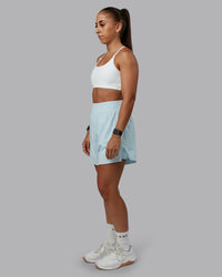 Woman wearing Challenger 5" Lined Performance Short in Skyride | Size:S | Model:Tylah