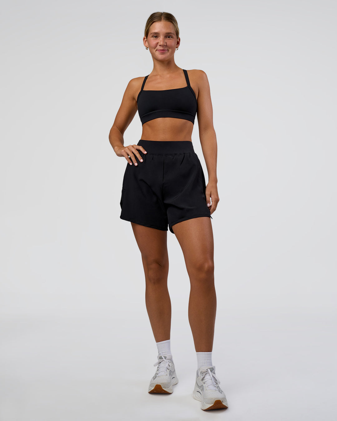 Woman wearing Challenger 5&quot; Lined Performance Short - Black | Model:Amity | Size:S