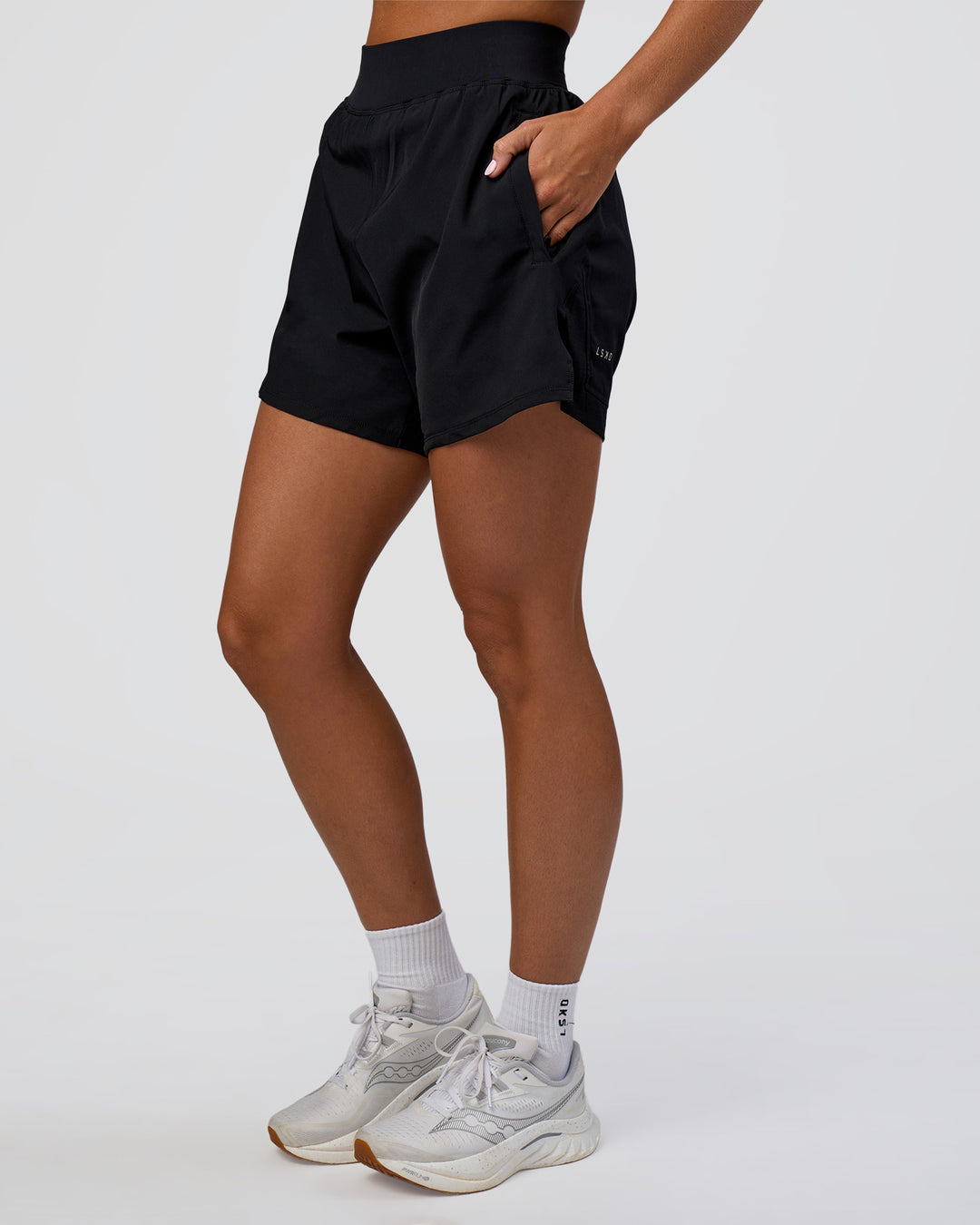 Woman wearing Challenger 5&quot; Lined Performance Short - Black | Model:Amity | Size:S