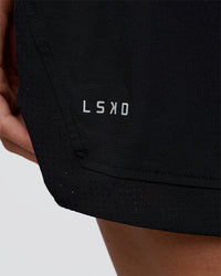 Woman wearing Challenger 5" Lined Performance Short - Black | Model:Amity | Size:S